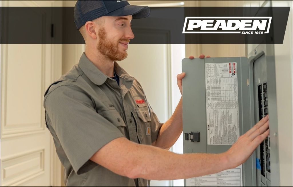 A Peaden Electrician working on a electrical panel