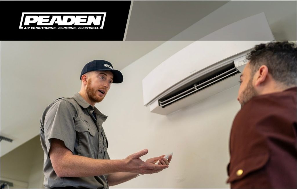 A Peaden HVAC tech explaining mini split AC units.