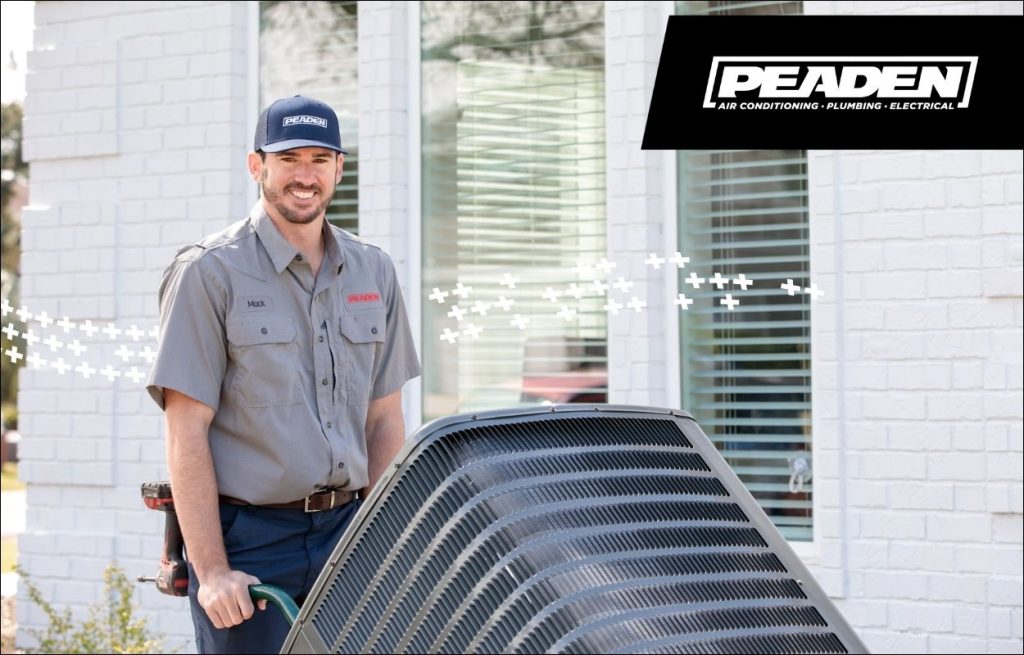 A Peaden HVAC tech delivering a new AC unit
