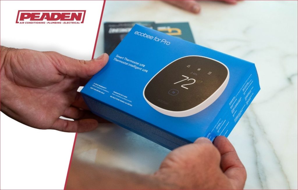A Peaden HVAC discussing a smart thermostat.